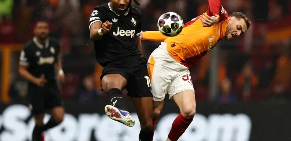 Player kicking ball during match action