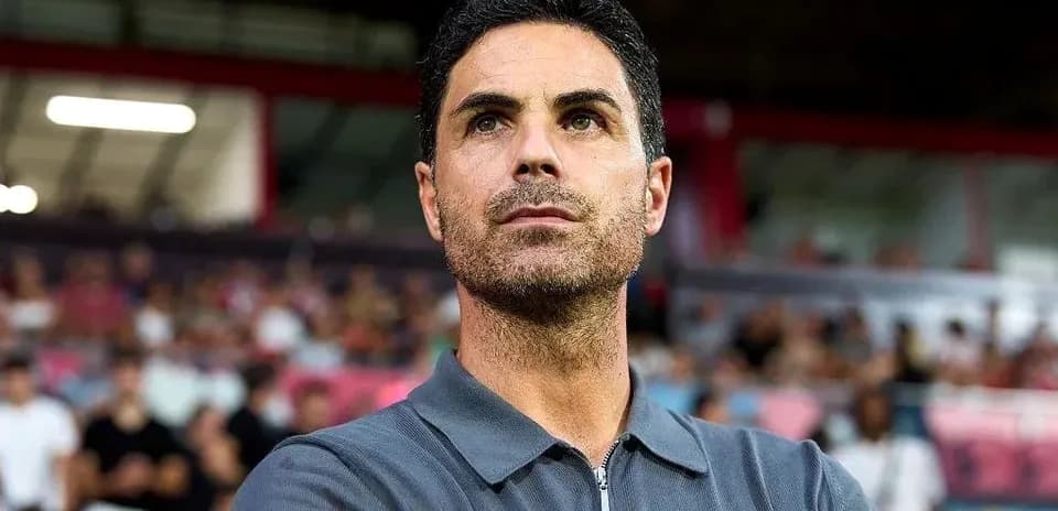 Coach observing match from the sidelines