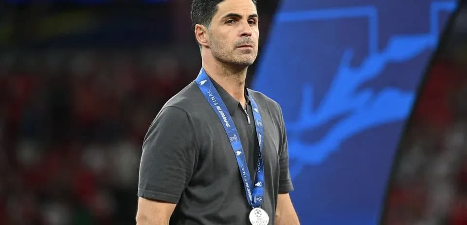 Coach wearing a silver medal after final match