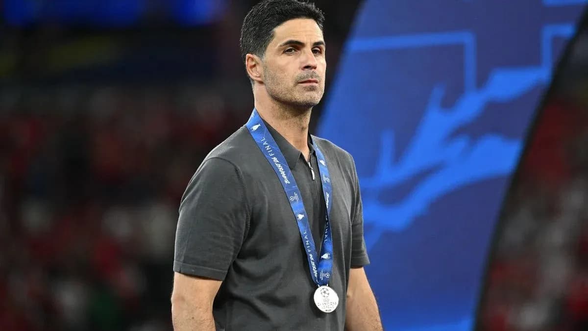 Coach wearing a silver medal after final match