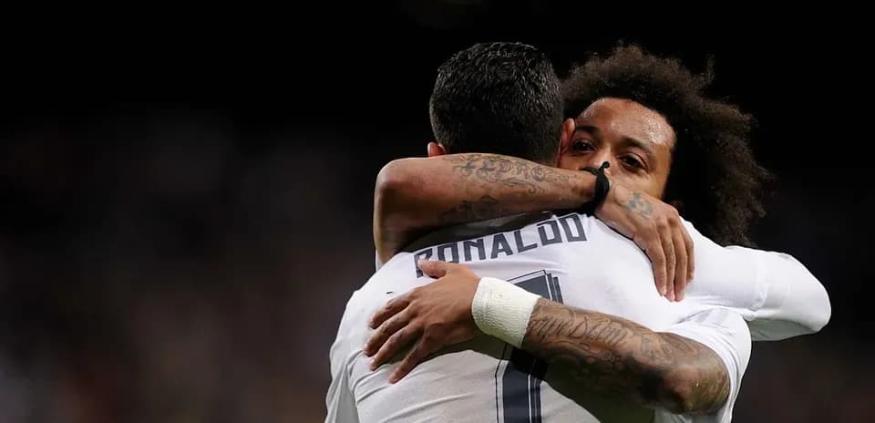 Cristiano Ronaldo and Marcelo celebrating a goal