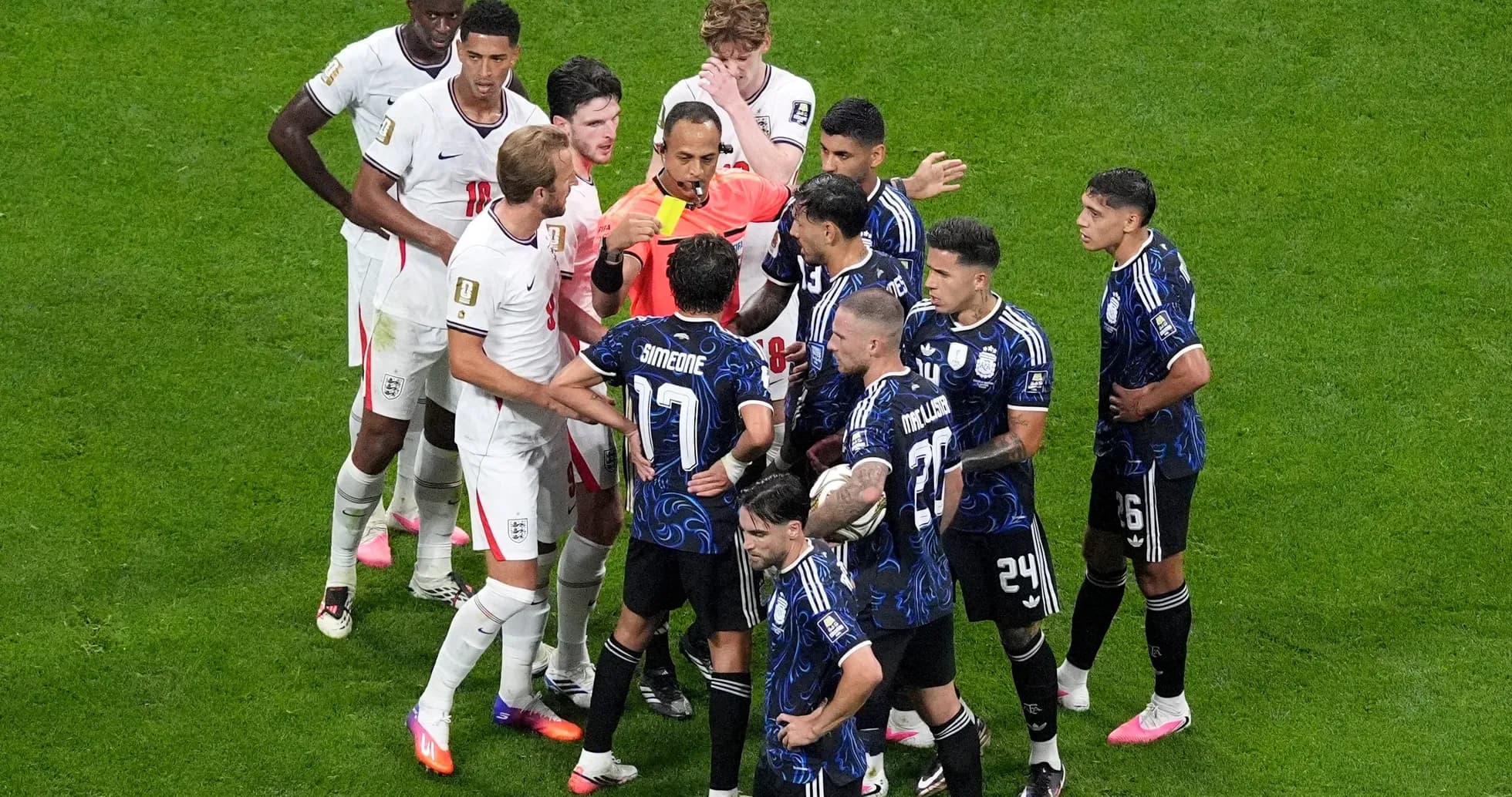 Players arguing with referee during England vs Argentina