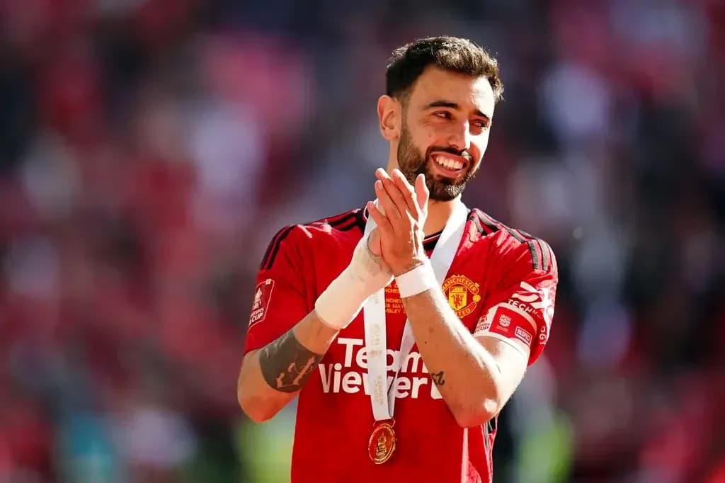 Player celebrating with medal after match victory