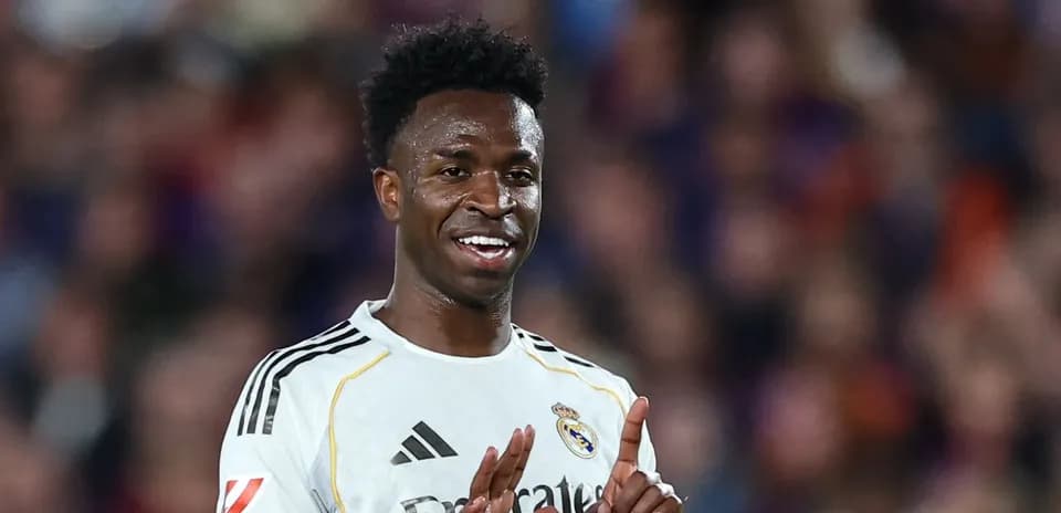 Player celebrating during match in Real Madrid kit