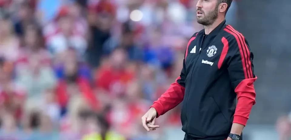 Coach on the sidelines during a football match