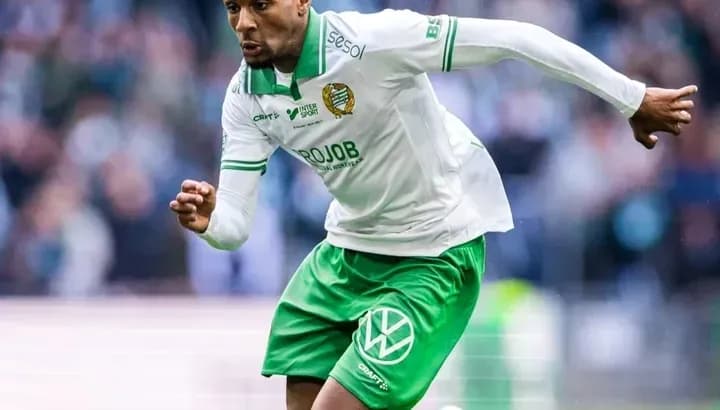 Player running with the ball during a match