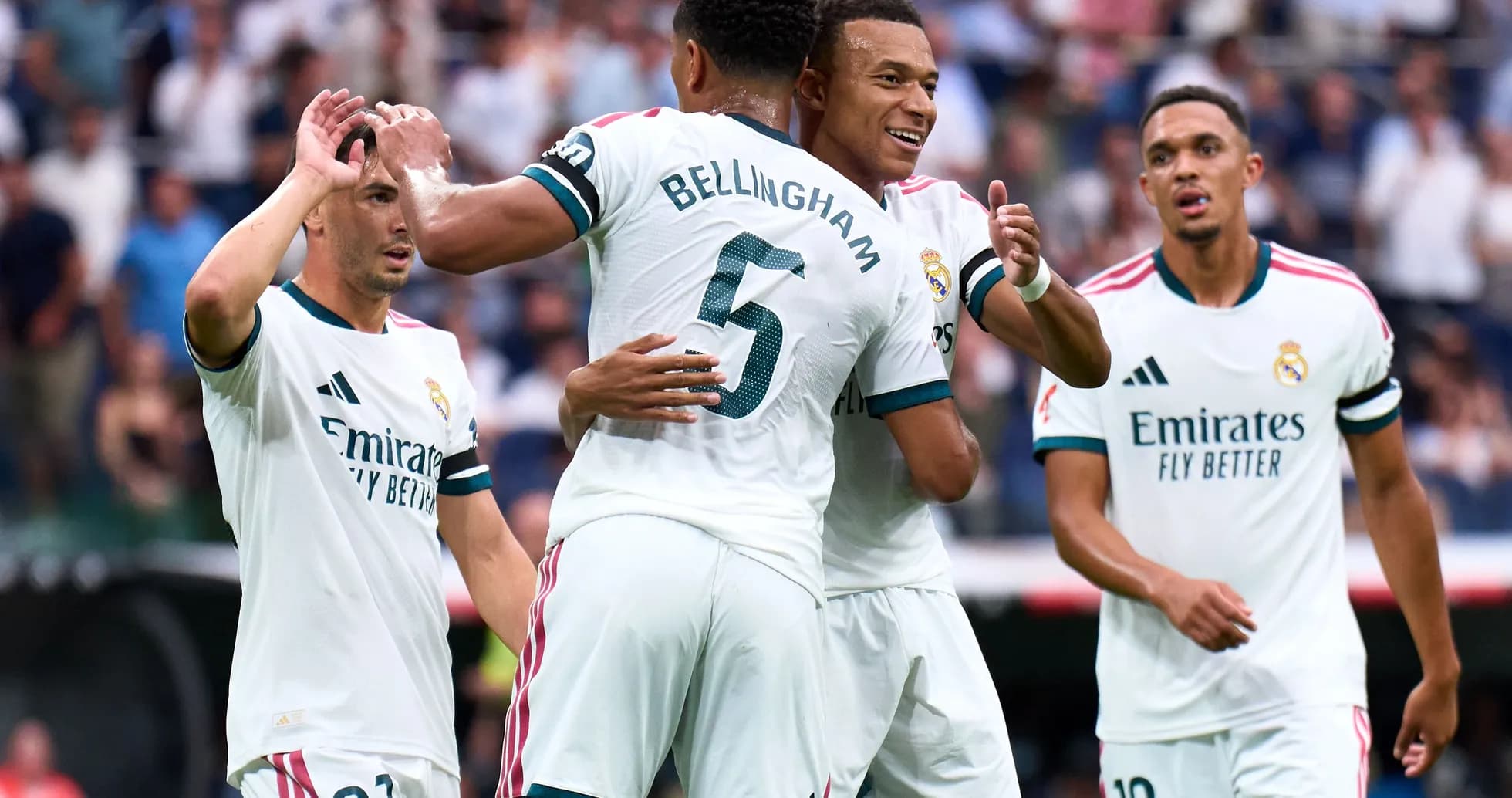 Real Madrid players celebrating a goal together