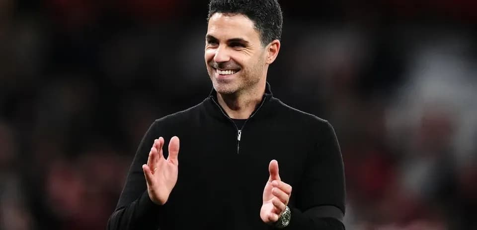 Manager applauding during match at the stadium