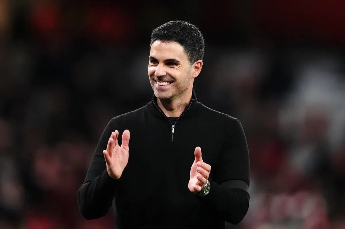 Manager applauding during match at the stadium