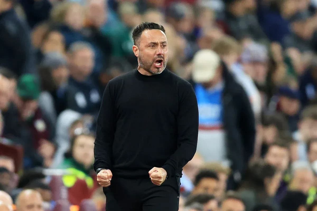 Coach celebrating passionately during a match