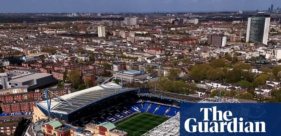 Aerial view of a stadium surrounded by cityscape