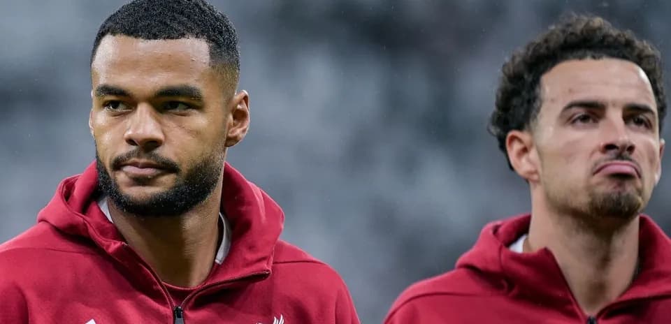 Two Liverpool players during pre-match warm-up