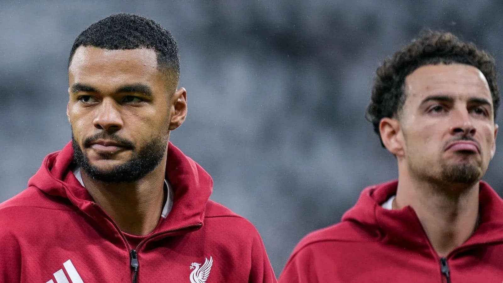 Two Liverpool players during pre-match warm-up
