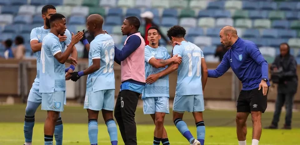 Players celebrating during CAF Confederation Cup match
