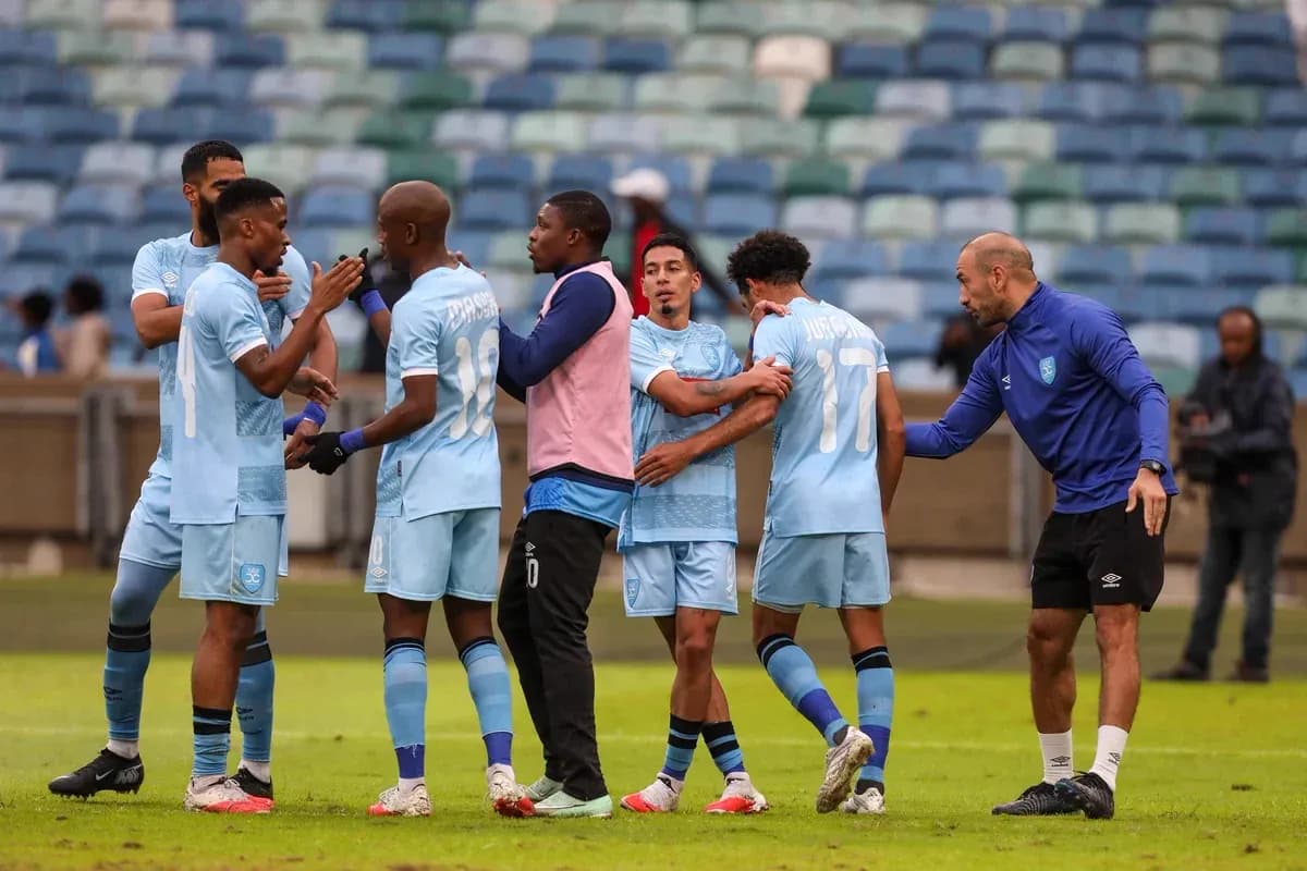 Players celebrating during CAF Confederation Cup match