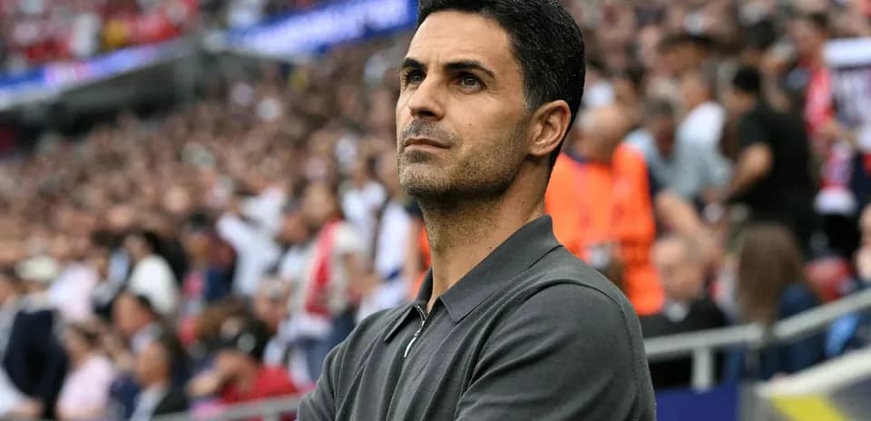 Manager observing the game from the sidelines