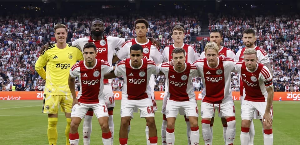 Ajax team posing for photo before the match
