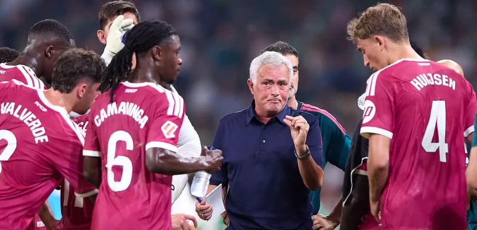 Manager discussing strategy with players during timeout