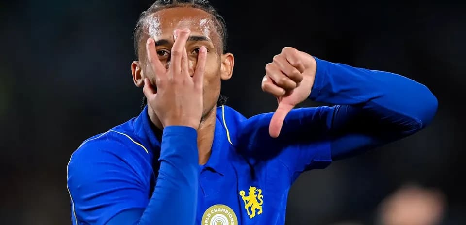 Player gesturing with hands during match celebration