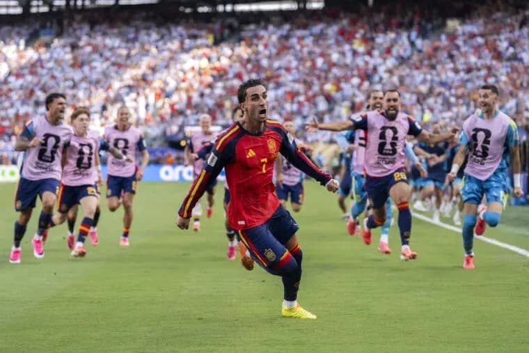 Spain players celebrating a goal during match