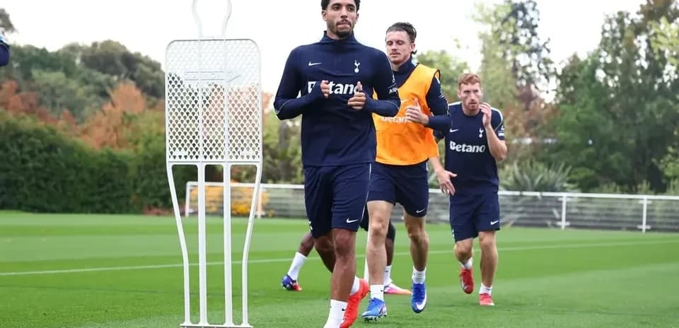 Tottenham players jogging during training session