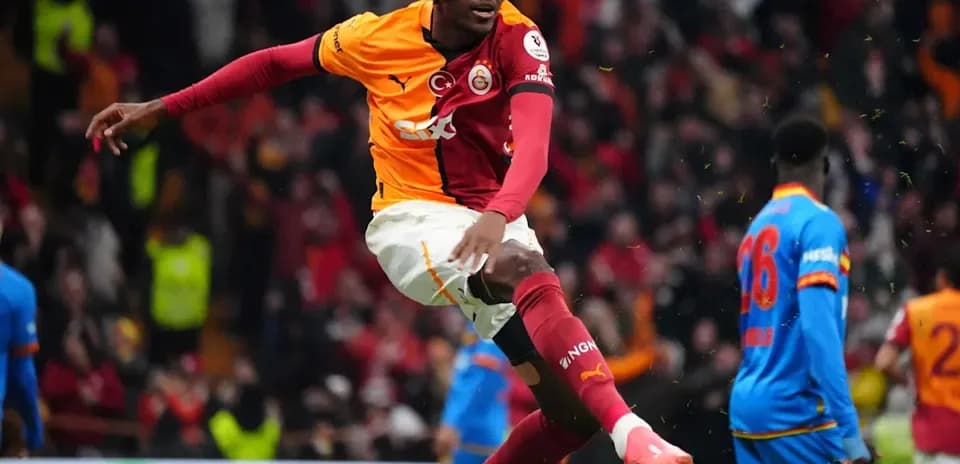 Player celebrating goal in Galatasaray uniform