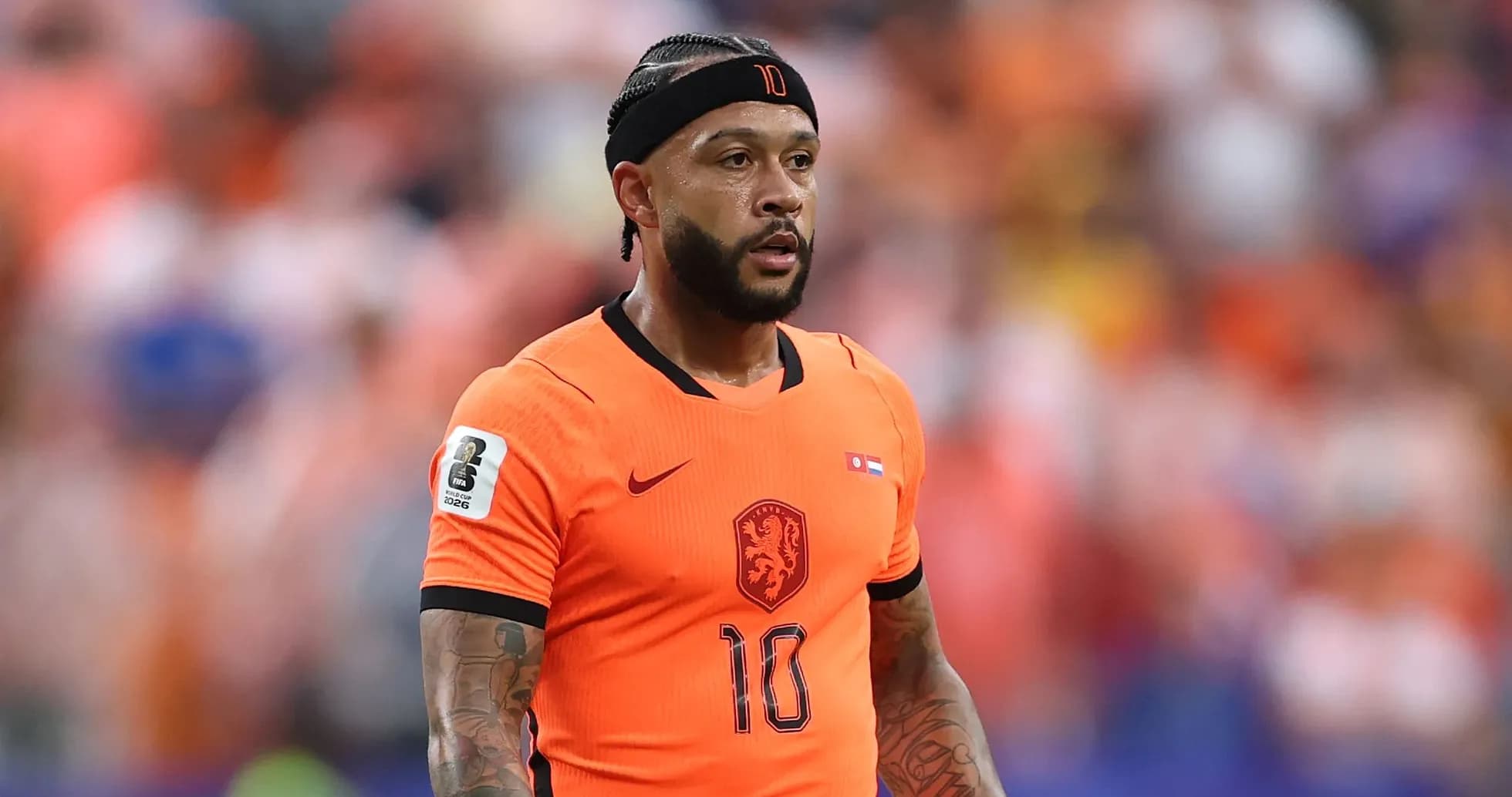 Player wearing orange jersey during match