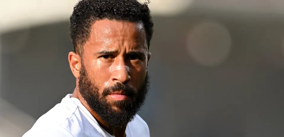 Player with beard and bandage on nose