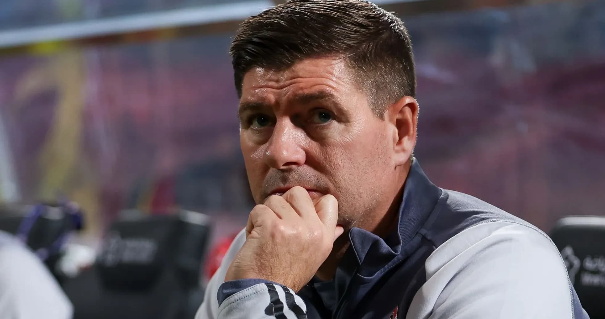 Coach observing the match from the sidelines