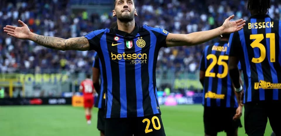 Player celebrating goal with teammates during match