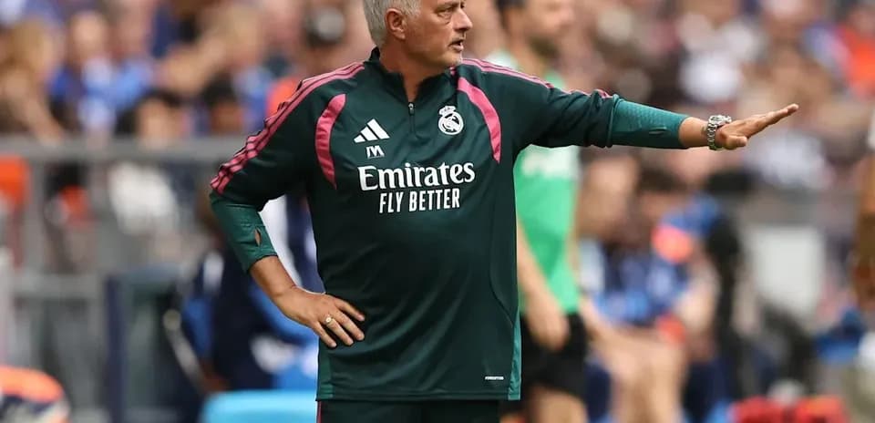 Coach giving instructions during a match