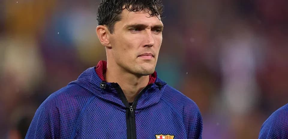 Player in Barcelona jacket during match warm-up