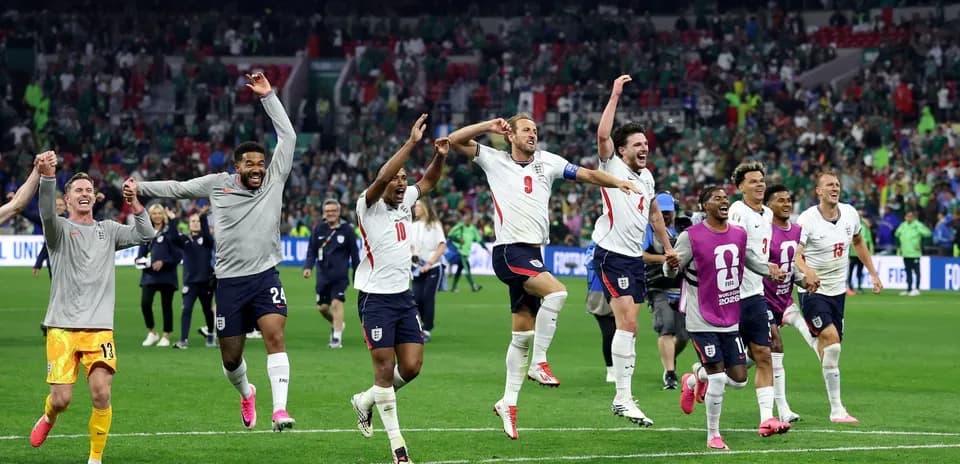 England players celebrating victory at World Cup match