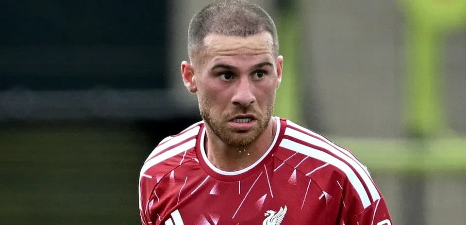 Player wearing red Liverpool jersey during training session