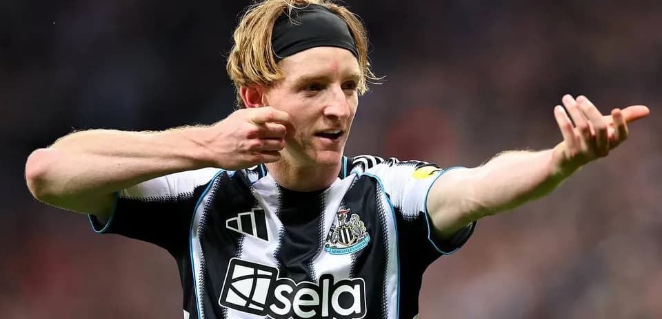 Newcastle player gesturing during match celebration