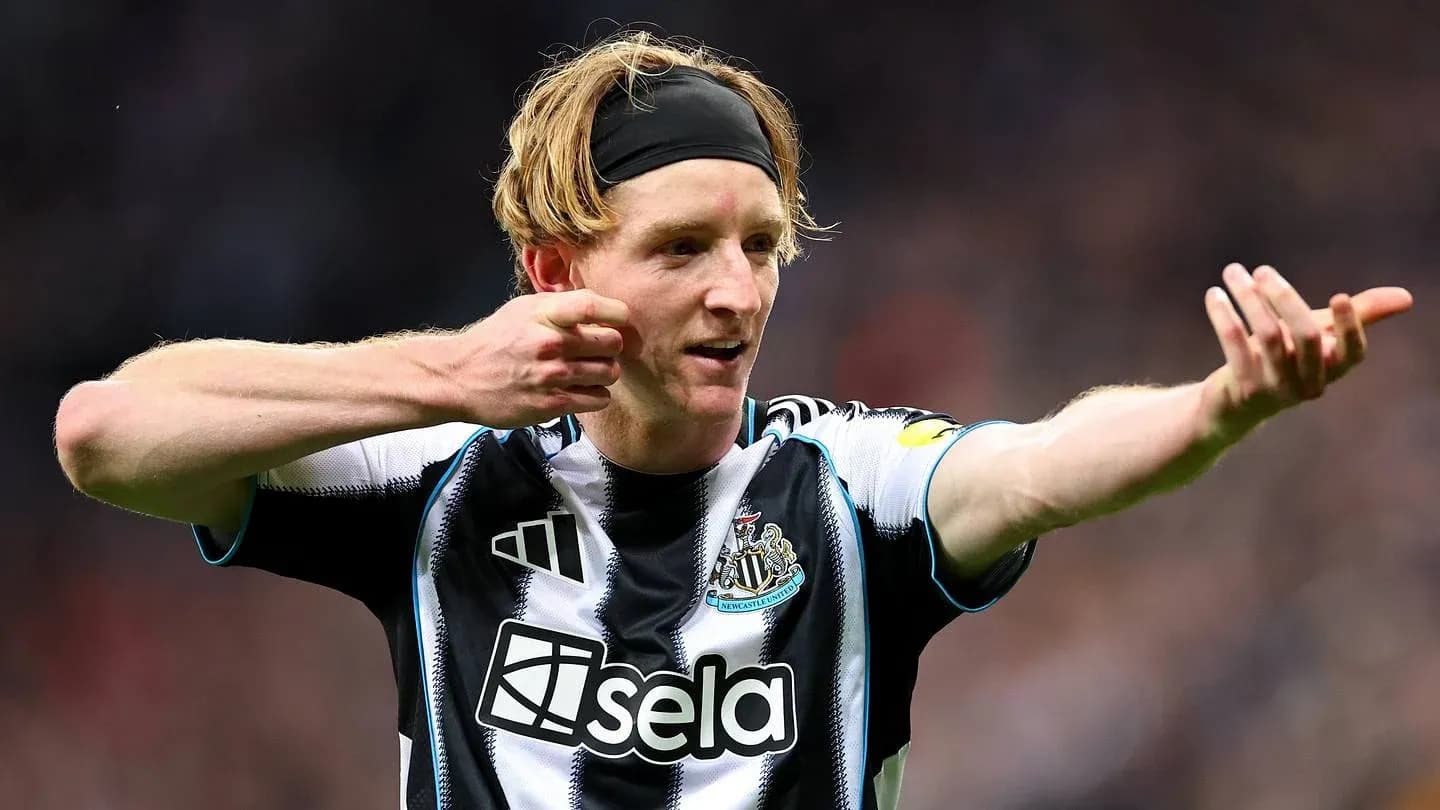 Newcastle player gesturing during match celebration
