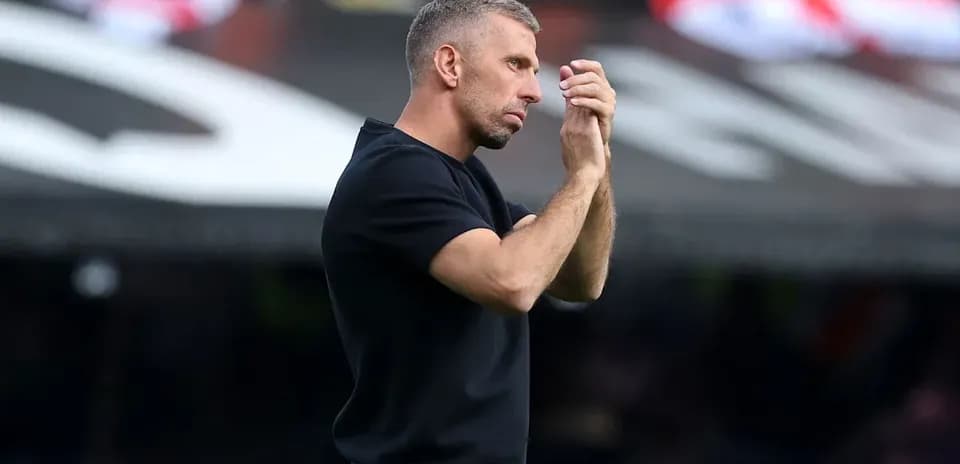 Coach giving instructions during a match