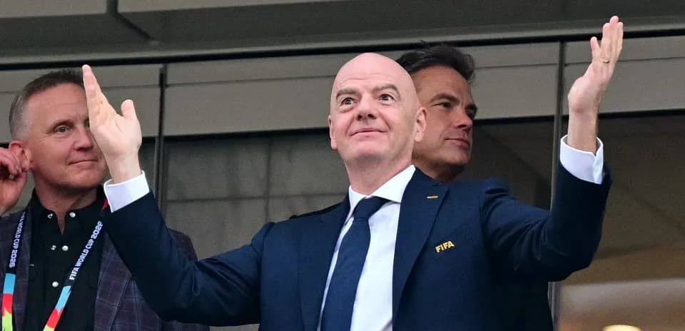 FIFA president gesturing during an event