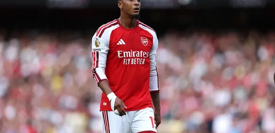Arsenal player standing on the pitch during match
