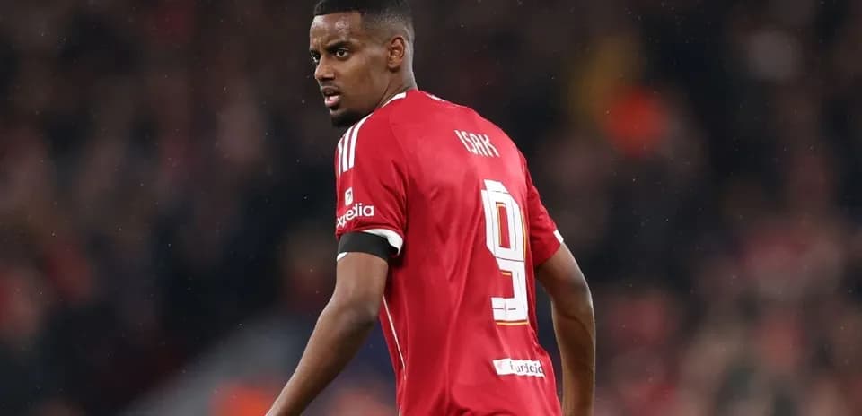 Player wearing red jersey with number 9 on field