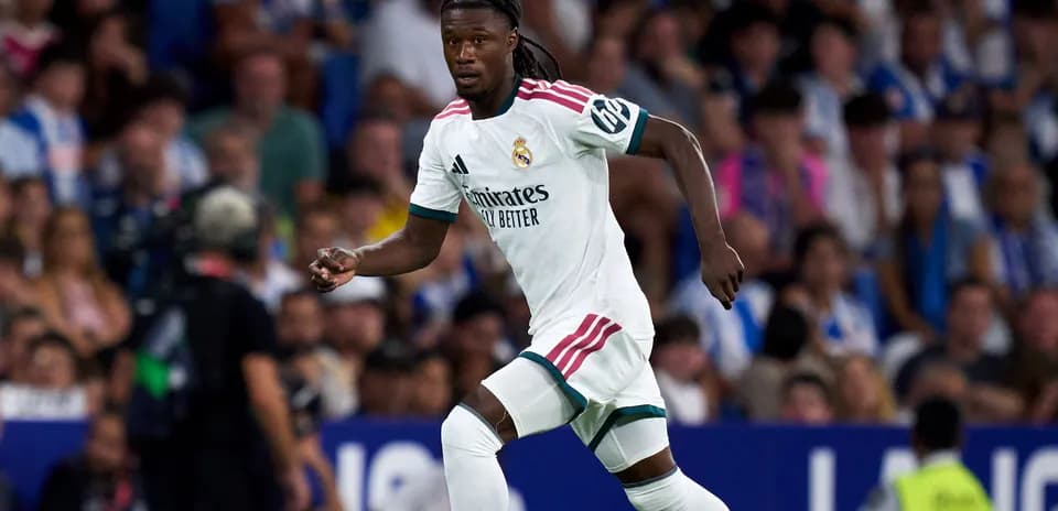 Player in Real Madrid kit running during match