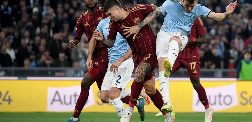 AS Roma players contesting the ball against Lazio