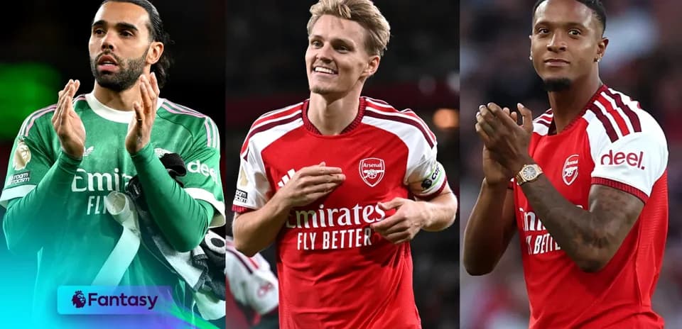 Three Arsenal players celebrating on the field