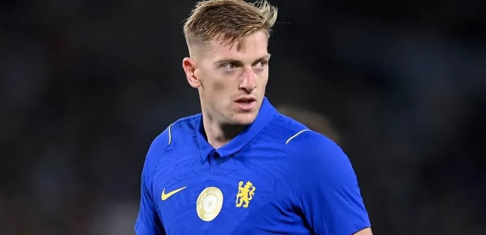 Player in blue jersey preparing for match