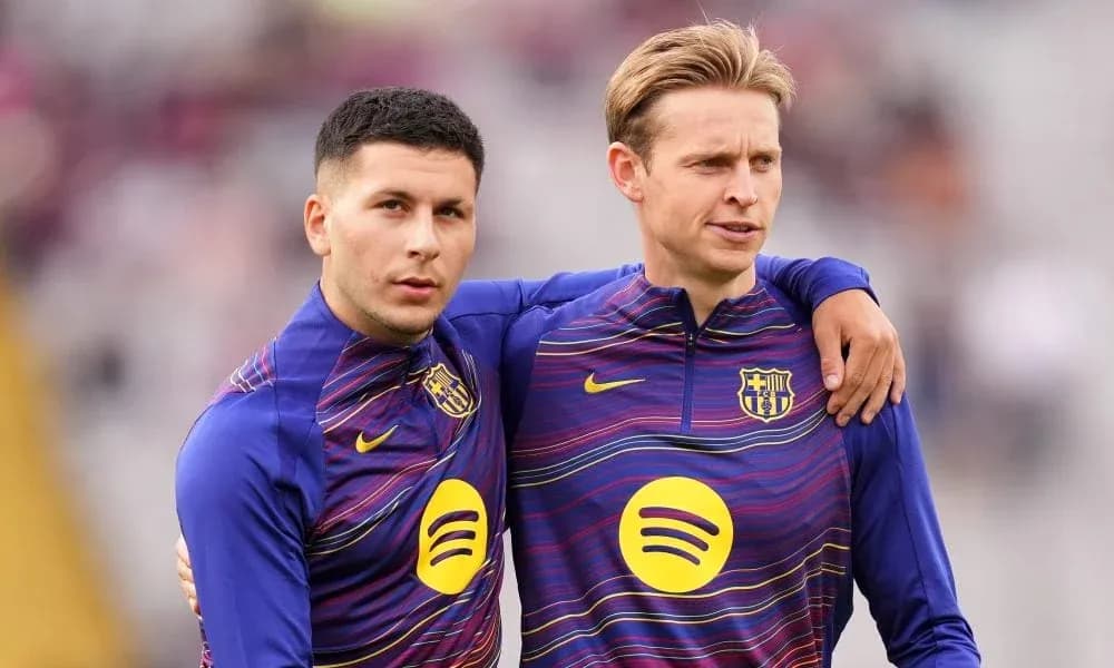 Two players in FC Barcelona training gear together