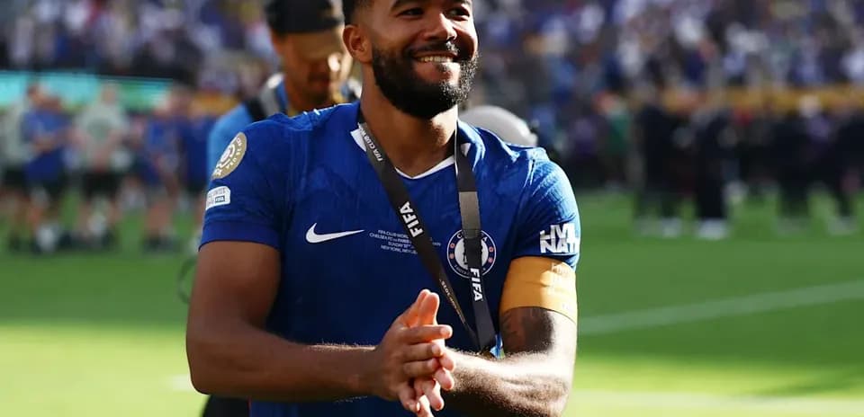 Player in blue jersey celebrating after a match