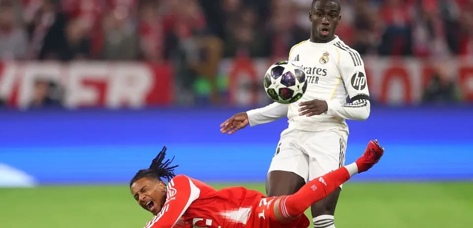 Player falling while opponent attempts to control the ball
