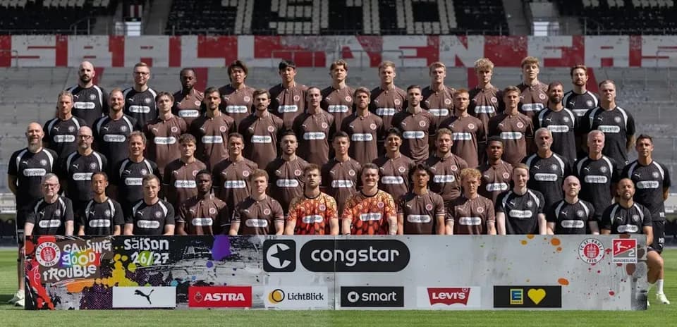 St. Pauli team photo in home jerseys at stadium