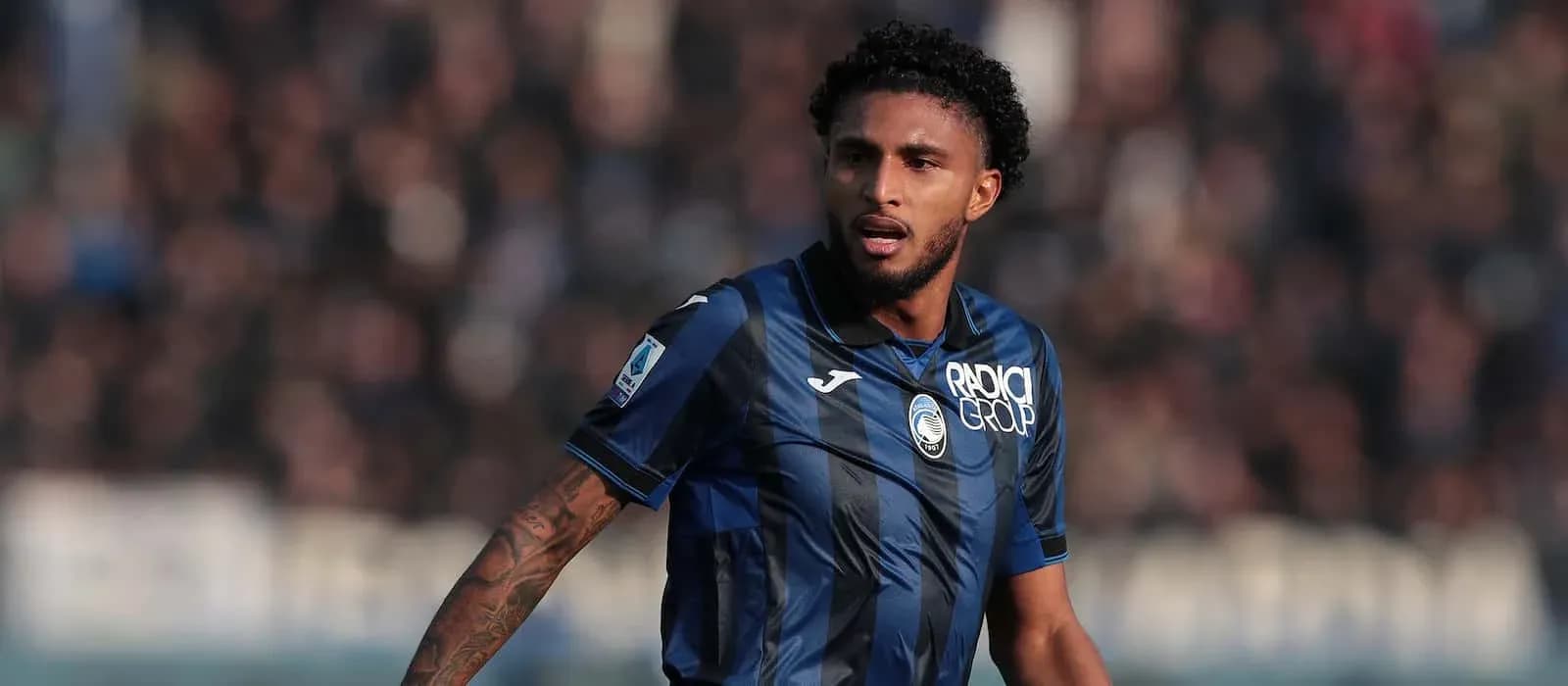 Player in Atalanta jersey during match action