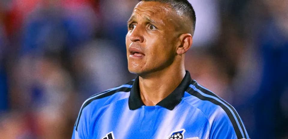 Player in blue jersey looking up during match